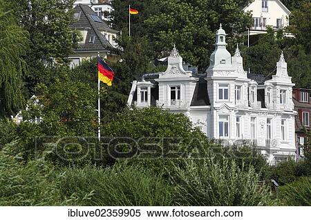 "Historic Strandhotel Blankenese, built in 1902, in Strandweg street, Hamburg's Blankenese quarter on the Elbe river, Altona district, suburb on the Elbe river, Hamburg, Germany, Europe, PublicGround, Europe" View Large Photo Image Stock Photography - "Historic Strandhotel Blankenese, built in 1902, in Strandweg street, Hamburg's Blankenese quarter on the Elbe river, Altona district, suburb on the Elbe river, Hamburg, Germany, Europe, PublicGround, Europe". Fotosearch