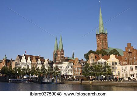 Stock Photo - "Historic town centre with St. Peter's Church and St. Mary's Church on the Upper Trave River, Lubeck, Schleswig-Holstein, Germany, Europe". Fotosearch