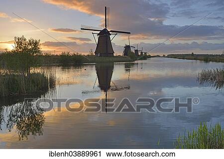 Stock Image - "Historic windmills, UNESCO World Heritage Site, Kinderdijk, South Holland, Netherlands". Fotosearch