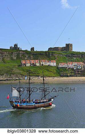 "Historical excursion boat with three masts, St. Mary's Church and Whitby Abbey at back, Whitby, North Yorkshire, England, United Kingdom, Europe" View Large Photo Image Stock Photo - "Historical excursion boat with three masts, St. Mary's Church and Whitby Abbey at back, Whitby, North Yorkshire, England, United Kingdom, Europe". Fotosearch