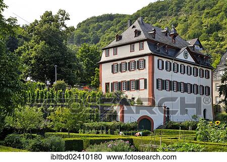 "Historical Parish Priory Garden of Hirzenach, rectory of St. Bartholomew's Church, Hirzenach, Boppard, Upper Middle Rhine Valley, UNESCO World Cultural Heritage Site, Rhineland-Palatinate, Germany, Europe" View Large Photo Image Stock Image - "Historical Parish Priory Garden of Hirzenach, rectory of St. Bartholomew's Church, Hirzenach, Boppard, Upper Middle Rhine Valley, UNESCO World Cultural Heritage Site, Rhineland-Palatinate, Germany, Europe". Fotosearch