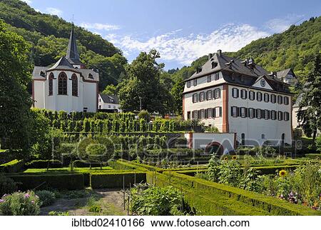 "Historical Parish Priory Garden of Hirzenach, Parish Church of St. Bartholomew and rectory, Hirzenach, Boppard, Upper Middle Rhine Valley, UNESCO World Cultural Heritage Site, Rhineland-Palatinate, Germany, Europe" View Large Photo Image Stock Photograph - "Historical Parish Priory Garden of Hirzenach, Parish Church of St. Bartholomew and rectory, Hirzenach, Boppard, Upper Middle Rhine Valley, UNESCO World Cultural Heritage Site, Rhineland-Palatinate, Germany, Europe". Fotosearch