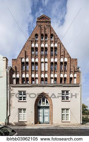 Stock Photography - "Historical town house with Northern German gable architecture in the historic centre of Stralsund, Mecklenburg-Western Pomerania, Germany, Europe". Fotosearch
