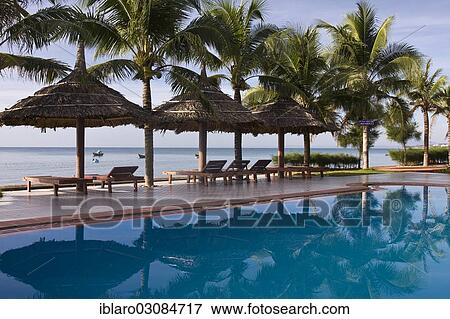 "Hoang Lan Resort, parasols by the pool, M??i Ne, Sudostasien, Vietnam, Asia" View Large Photo Image Stock Photo - "Hoang Lan Resort, parasols by the pool, M??i Ne, Sudostasien, Vietnam, Asia". Fotosearch