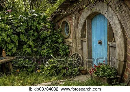 "Hobbit-hole in Hobbiton, location of the Lord of the Rings and The Hobbit film trilogy, Hinuera, Matamata, North Island, New Zealand, Oceania" View Large Photo Image Stock Image - "Hobbit-hole in Hobbiton, location of the Lord of the Rings and The Hobbit film trilogy, Hinuera, Matamata, North Island, New Zealand, Oceania". Fotosearch