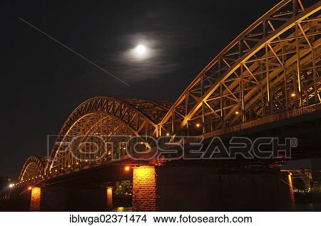 Picture - "Hohenzollern Bridge at night, Rhine, Cologne, Rhineland, North Rhine-Westphalia, Germany, Europe". Fotosearch