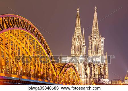 Stock Image - "Hohenzollern Bridge, Cologne Cathedral, Cologne, Rhineland, North Rhine-Westphalia, Germany, Europe". Fotosearch