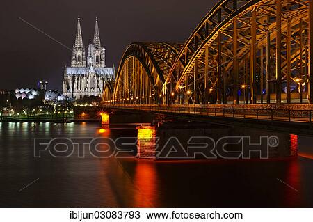 "Hohenzollern Bridge over the Rhine, Cologne Cathedral and the Cologne Philharmonic Hall, at night, Cologne, Rhineland, North Rhine-Westphalia, Germany, Europe" View Large Photo Image Stock Image - "Hohenzollern Bridge over the Rhine, Cologne Cathedral and the Cologne Philharmonic Hall, at night, Cologne, Rhineland, North Rhine-Westphalia, Germany, Europe". Fotosearch