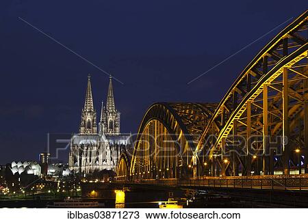 "Hohenzollern Bridge with Cologne Cathedral at dusk, Cologne, North Rhine-Westphalia, Germany, Europe" View Large Photo Image Stock Image - "Hohenzollern Bridge with Cologne Cathedral at dusk, Cologne, North Rhine-Westphalia, Germany, Europe". Fotosearch