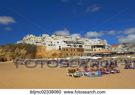 "Holidaymakers on the beach, Albufeira, Praia Dos Pescadores, Algarve, Portugal, Europe" View Large Photo Image Stock Image - "Holidaymakers on the beach, Albufeira, Praia Dos Pescadores, Algarve, Portugal, Europe". Fotosearch