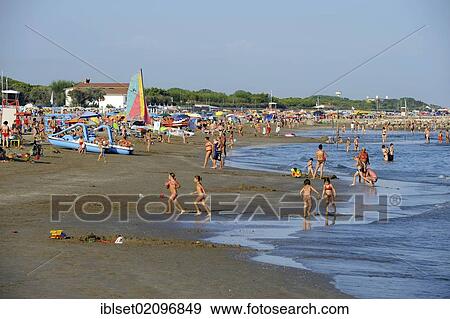 "Holidaymakers on the beach of the northern Adriatic Sea at the Cavallino camping site, Jesolo, Venice, Italy, Europe" View Large Photo Image Stock Photo - "Holidaymakers on the beach of the northern Adriatic Sea at the Cavallino camping site, Jesolo, Venice, Italy, Europe". Fotosearch