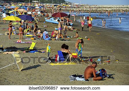 "Holidaymakers on the beach of the northern Adriatic Sea at the Cavallino camping site, Jesolo, Venice, Italy, Europe" View Large Photo Image Stock Photo - "Holidaymakers on the beach of the northern Adriatic Sea at the Cavallino camping site, Jesolo, Venice, Italy, Europe". Fotosearch