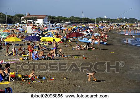 "Holidaymakers on the beach of the northern Adriatic Sea at the Cavallino camping site, Jesolo, Venice, Italy, Europe" View Large Photo Image Stock Photography - "Holidaymakers on the beach of the northern Adriatic Sea at the Cavallino camping site, Jesolo, Venice, Italy, Europe". Fotosearch