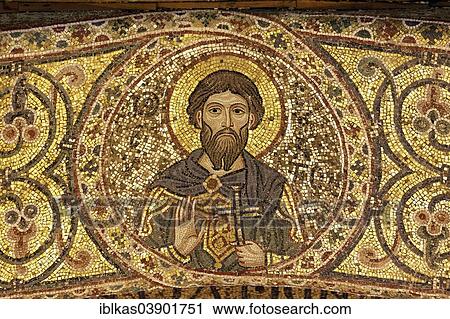 Stock Image - "Holy figure, Byzantine mosaic, Cappella Palatina, Palatine Chapel, Palazzo dei Norman or Norman Palace, Palermo, Sicily, Italy, Europe". Fotosearch