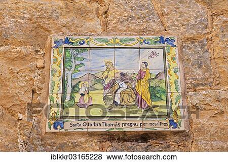 "Holy image on tiles on a house wall, Valldemossa, Majorca, Balearic Islands, Spain, Europe" View Large Photo Image Stock Photo - "Holy image on tiles on a house wall, Valldemossa, Majorca, Balearic Islands, Spain, Europe". Fotosearch
