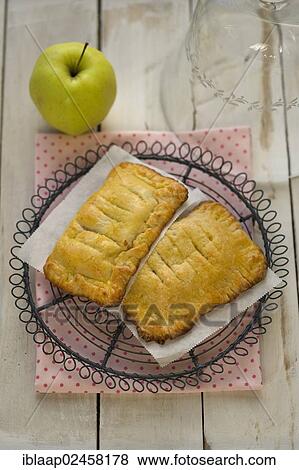 Homemade organic apple pies made from spelt flour View Large Photo Image Stock Photo - Homemade organic apple pies made from spelt flour. Fotosearch