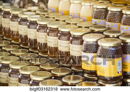 "Honey jars at a market stall, Greoux-les-Bains, Provence-Alpes-Cote d? ÇÖAzur, France, Europe" View Large Photo Image Stock Photo - "Honey jars at a market stall, Greoux-les-Bains, Provence-Alpes-Cote d? ÇÖAzur, France, Europe". Fotosearch