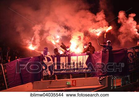 "Hooligans, flares, pyrotechnics, masked people in the fan block, Mercedes-Benz Arena, Stuttgart, Baden-Wurttemberg, Germany, Europe" View Large Photo Image Picture - "Hooligans, flares, pyrotechnics, masked people in the fan block, Mercedes-Benz Arena, Stuttgart, Baden-Wurttemberg, Germany, Europe". Fotosearch