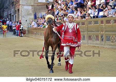 "Horse and horse leader of the Contrada of the Giraffe, Imperiale Contrada della Giraffa, at the parade before the historical horse race Palio di Siena, Piazza del Campo, Siena, Tuscany, Italy, Europe" View Large Photo Image Stock Image - "Horse and horse leader of the Contrada of the Giraffe, Imperiale Contrada della Giraffa, at the parade before the historical horse race Palio di Siena, Piazza del Campo, Siena, Tuscany, Italy, Europe". Fotosearch