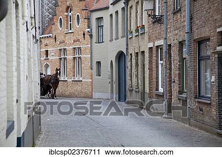 "Horse carriage in the center of Bruges, Flanders, Belgium, Europe" View Large Photo Image Stock Image - "Horse carriage in the center of Bruges, Flanders, Belgium, Europe". Fotosearch