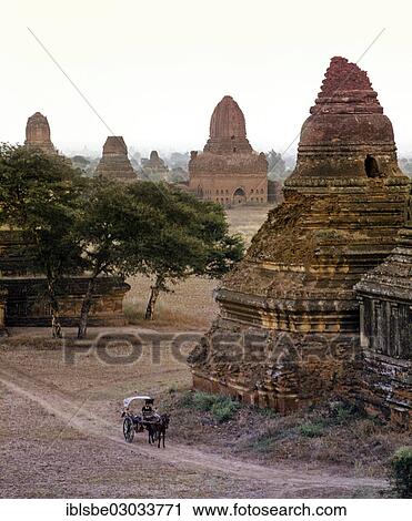 "Horse-drawn carriage in a field with ruins of Buddhist pagodas and temples, Ebene von Pagan, Bagan, Mandalay Division, Myanmar, Burma, Asia" View Large Photo Image Stock Image - "Horse-drawn carriage in a field with ruins of Buddhist pagodas and temples, Ebene von Pagan, Bagan, Mandalay Division, Myanmar, Burma, Asia". Fotosearch