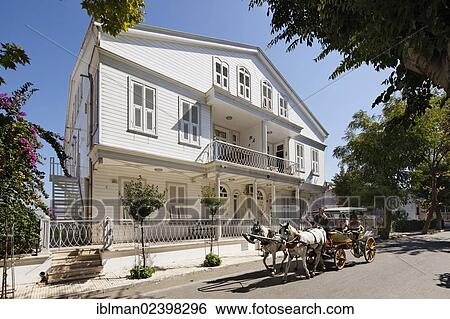 "Horse-drawn carriage in front of a wooden mansion, Buyukada, Princes Islands, Adalar, Marmara Region, Istanbul, Turkey, Asia" View Large Photo Image Stock Photograph - "Horse-drawn carriage in front of a wooden mansion, Buyukada, Princes Islands, Adalar, Marmara Region, Istanbul, Turkey, Asia". Fotosearch