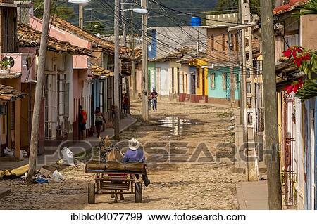 "Horse drawn carriage on a dirt road, Trinidad, Sancti Spiritus Province, Cuba, North America" View Large Photo Image Stock Photo - "Horse drawn carriage on a dirt road, Trinidad, Sancti Spiritus Province, Cuba, North America". Fotosearch