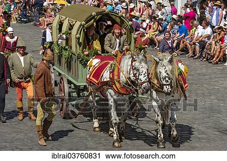 "Horse-drawn covered wagon, medieval wedding procession wearing traditional costume to celebrate """"Landshut Wedding 1475"""", historic center, Landshut, Lower Bavaria, Bavaria, Germany, Europe" View Large Photo Image Stock Image - "Horse-drawn covered wagon, medieval wedding procession wearing traditional costume to celebrate """"Landshut Wedding 1475"""", historic center, Landshut, Lower Bavaria, Bavaria, Germany, Europe". Fotosearch
