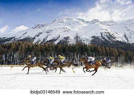 Stock Photo - "Horse racing on a frozen lake, St. Moritz, Engadin, Graubunden, Switzerland, Europe". Fotosearch