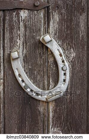 "Horseshoe, painted silver, on a wooden wall, Oberallgau, Allgau, Bavaria, Germany, Europe" View Large Photo Image Stock Photo - "Horseshoe, painted silver, on a wooden wall, Oberallgau, Allgau, Bavaria, Germany, Europe". Fotosearch
