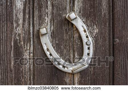 "Horseshoe, painted silver, on a wooden wall, Oberallgau, Allgau, Bavaria, Germany, Europe" View Large Photo Image Stock Photography - "Horseshoe, painted silver, on a wooden wall, Oberallgau, Allgau, Bavaria, Germany, Europe". Fotosearch