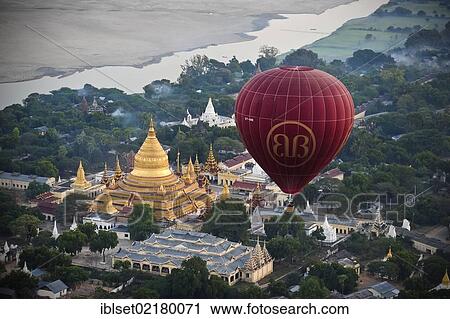 "Hot air balloon at dawn over the Shwezigon Pagoda in Bagan, Myanmar, Burma, Southeast Asia, Asia" View Large Photo Image Stock Image - "Hot air balloon at dawn over the Shwezigon Pagoda in Bagan, Myanmar, Burma, Southeast Asia, Asia". Fotosearch