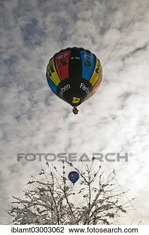 Stock Image - "Hot-air balloons, 12th Tegernseer Tal Montgolfiade, Bad Wiessee, Bavaria, Germany, Europe, Bad Wiessee, Germany, Europe". Fotosearch