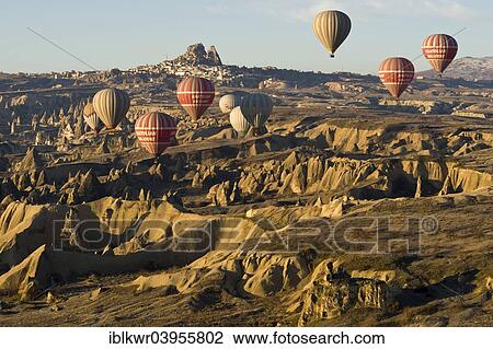 "Hot air balloons in front of the Castle of Uchisar, Erosion landscape, Cappadocia, Turkey, Asia" View Large Photo Image Stock Image - "Hot air balloons in front of the Castle of Uchisar, Erosion landscape, Cappadocia, Turkey, Asia". Fotosearch