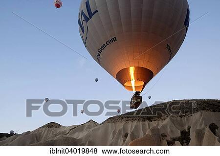 "Hot air balloons over Goreme, Cappadocia, Central Anatolia Region, Turkey, Asia" View Large Photo Image Stock Photo - "Hot air balloons over Goreme, Cappadocia, Central Anatolia Region, Turkey, Asia". Fotosearch
