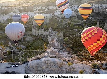 "Hot air balloons over Goreme, Cappadocia, Central Anatolia Region, Turkey, Asia" View Large Photo Image Stock Photo - "Hot air balloons over Goreme, Cappadocia, Central Anatolia Region, Turkey, Asia". Fotosearch