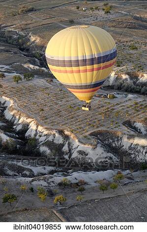 "Hot air balloons over Goreme, Cappadocia, Central Anatolia Region, Turkey, Asia" View Large Photo Image Stock Photography - "Hot air balloons over Goreme, Cappadocia, Central Anatolia Region, Turkey, Asia". Fotosearch