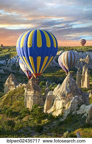"Hot air balloons over the Love Valley at sunrise, Cappadocia, Turkey, Asia" View Large Photo Image Stock Photo - "Hot air balloons over the Love Valley at sunrise, Cappadocia, Turkey, Asia". Fotosearch