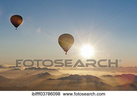 "Hot air balloons over the Tegernsee, Bavaria, Germany, Europe" View Large Photo Image Stock Photo - "Hot air balloons over the Tegernsee, Bavaria, Germany, Europe". Fotosearch