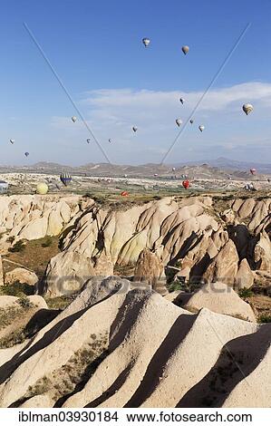 "Hot air balloons, tufa formations at Sunset View Point, Goreme National Park, Cappadocia, Central Anatolia Region, Anatolia, Turkey, Asia" View Large Photo Image Picture - "Hot air balloons, tufa formations at Sunset View Point, Goreme National Park, Cappadocia, Central Anatolia Region, Anatolia, Turkey, Asia". Fotosearch