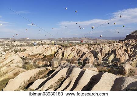 "Hot air balloons, tufa formations at Sunset View Point, Goreme National Park, Cappadocia, Central Anatolia Region, Anatolia, Turkey, Asia" View Large Photo Image Stock Image - "Hot air balloons, tufa formations at Sunset View Point, Goreme National Park, Cappadocia, Central Anatolia Region, Anatolia, Turkey, Asia". Fotosearch