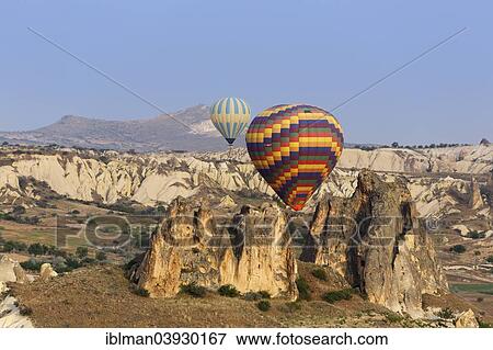 "Hot air balloons, tufa formations, Goreme National Park, Cappadocia, Central Anatolia Region, Anatolia, Turkey, Asia" View Large Photo Image Stock Photo - "Hot air balloons, tufa formations, Goreme National Park, Cappadocia, Central Anatolia Region, Anatolia, Turkey, Asia". Fotosearch