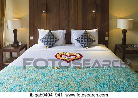 "Hotel bed decorated with flower petals, Ubud, Bali, Indonesia, Asia" View Large Photo Image Stock Image - "Hotel bed decorated with flower petals, Ubud, Bali, Indonesia, Asia". Fotosearch