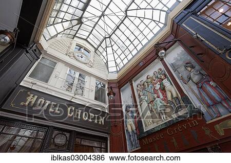 Stock Photograph - "Hotel Chopin, 1846, and the Musee Grevin mural, historic shopping arcade, Passage Jouffroy, Grands Boulevards, 2nd Arrondissement, Paris, Ile-de-France, France, Europe". Fotosearch