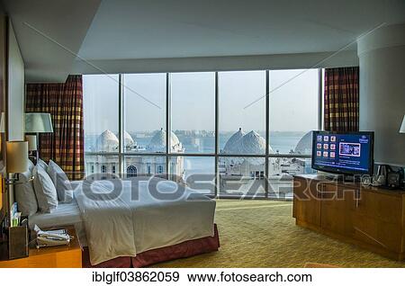 Stock Photo - "Hotel room, suite, Hilton Doha, Doha, Qatar, United Arab Emirates, Asia". Fotosearch
