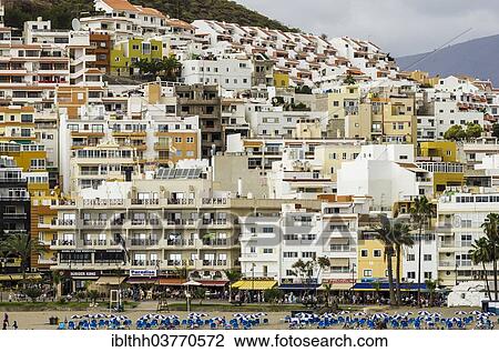 "Hotels and apartments at a section of beach, Arona, Tenerife, Canary Islands, Spain, Europe" View Large Photo Image Stock Image - "Hotels and apartments at a section of beach, Arona, Tenerife, Canary Islands, Spain, Europe". Fotosearch