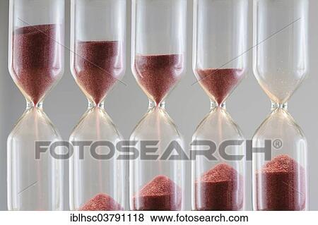 "Hourglasses, different sand levels" View Large Photo Image Stock Photo - "Hourglasses, different sand levels". Fotosearch