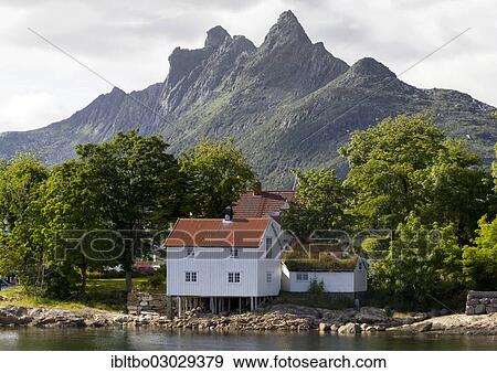 Stock Photo - "House beside the fjord, Svolvaer, Lofoten, Nordland, Norway, Europe". Fotosearch