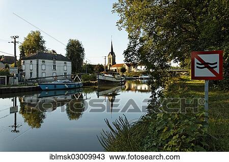 "House boat in the harbour on the Canal des Vosges, formerly Canal de l'Est, Corre, Vesoul, Haute-Saone, Franche-Comte, France, Europe" View Large Photo Image Stock Image - "House boat in the harbour on the Canal des Vosges, formerly Canal de l'Est, Corre, Vesoul, Haute-Saone, Franche-Comte, France, Europe". Fotosearch