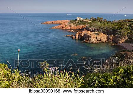 "House by the sea, bay in the Esterel region, Alpes Maritimes, Cote d??Azur, Departement Var, Region Provence-Alpes-Cote d? ÇÖAzur, France, Europe" View Large Photo Image Stock Photo - "House by the sea, bay in the Esterel region, Alpes Maritimes, Cote d??Azur, Departement Var, Region Provence-Alpes-Cote d? ÇÖAzur, France, Europe". Fotosearch